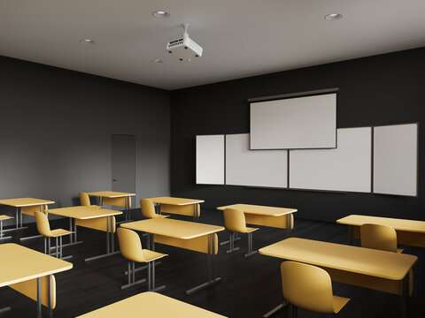 Dark school room interior with desk in row and chalkboard with screen mockup