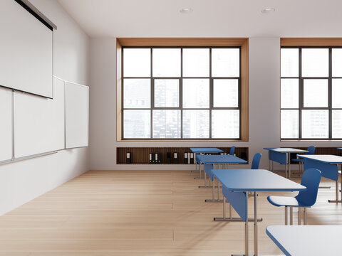 White classroom interior with projection screen
