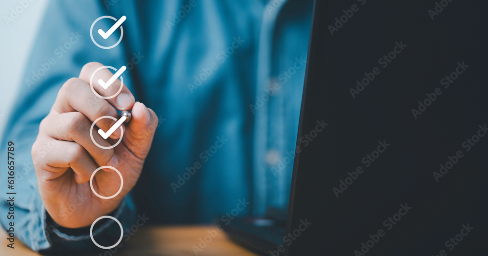 Poster Businessman use pen to tick correct sign mark in checkbox for quality document control checklist and business approve project concept.
