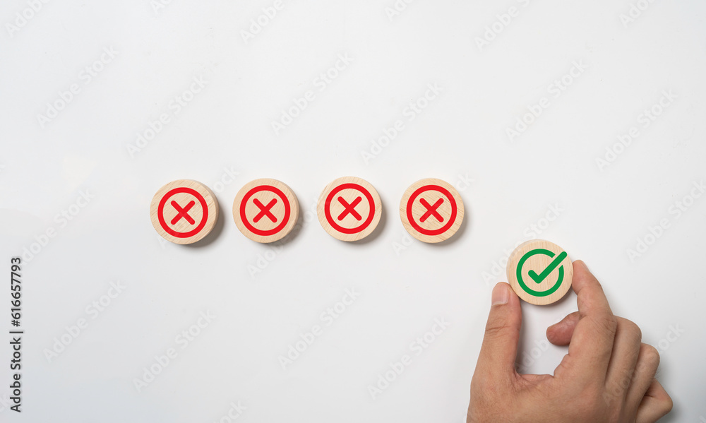 Poster Hand holding green correct sign symbol with Red Cross sign for approve document and project concept.