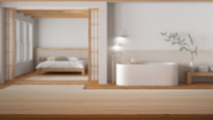 Fototapeta na wymiar Empty wooden table, desk or shelf with blurred view of bathroom and bedroom in minimal style. Bed and freestanding bathtub, modern interior design concept
