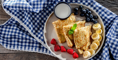 Home-made Polish pancakes filled with sweet cottage cheese