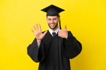 Young university graduate caucasian man isolated on yellow background counting six with fingers