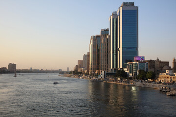 Obraz premium The Nile and tall buildings