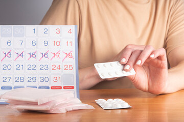 Means of hygiene during menstruation. Pain in women during menstruation. Painkillers that relieve...