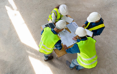 team of civil technician engineers discuss the timeline with architect foreman worker while...