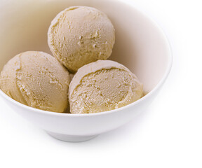 Fototapeta na wymiar pistachio ice cream in white bowl
