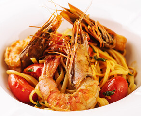 Pasta spaghetti with shrimps and tomato