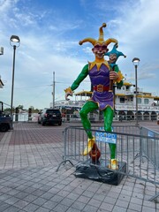 Mardi Gras jester statue at the riverwalk in New Orleans