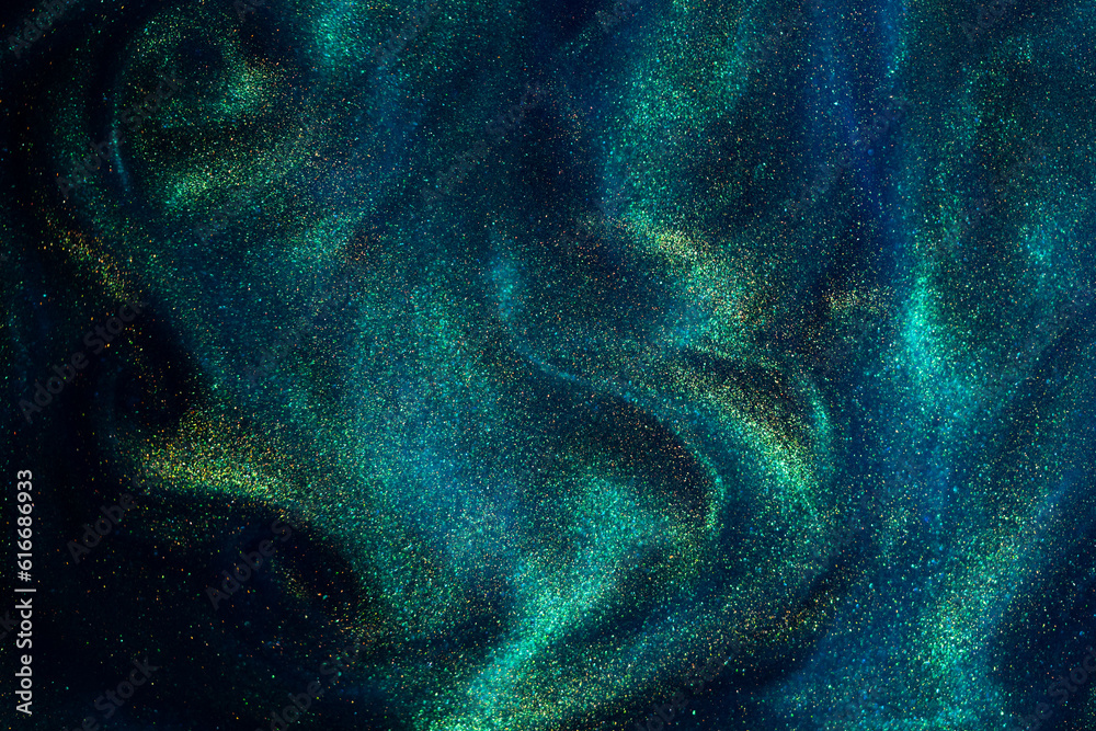 Wall mural various stains and overflows of gold particles in blue fluid with green tints. golden particles dust