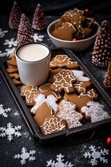 Fototapeta premium gingerbread cookies and hot cocoa on a festive tray, created with generative ai