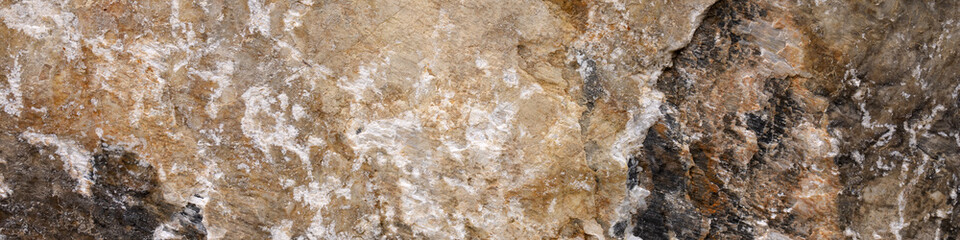 Banner 4x1 to website or social network from chipped multicolored natural stone with white veins