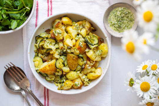 Roast potato and zucchini salad with capers and garlic dressing