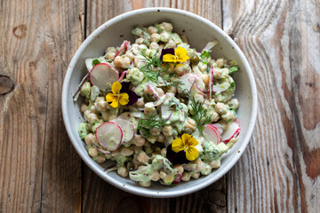 Chickpea salad with avocado, pickled onion and radishes