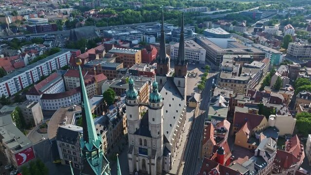Drone shot revealing Marktkirche Unser Lieben Frauen (Market Church Of Our Lady), Halle (Saale) city , Saxony-Anhalt  , Germany .