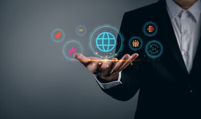 Business hand showing symbols and icons of internet advertising, global digital marketing and quarterly increase sales, business technology concept, online marketing, e-business,ecommerce online