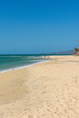 Fototapeta na wymiar Beach's day. Seashore. Walk through the Caribbean Sea. Sand. Vacation.