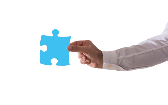 Isolated  businessman holds a piace of puzzle. Concept teamwork, partnership, integration