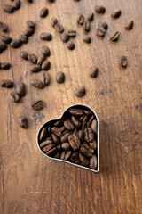 coffee beans on wooden background