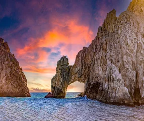 Poster Cape Saint Luke Arch under a beautiful sunset over the Gulf of California that separates the Sea of Cortez from the Pacific Ocean, landscapes of Baja California Sur, Mexico. © Lifes_Sunday