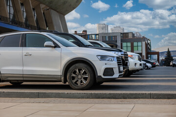 Cars in a parking lot in the city center