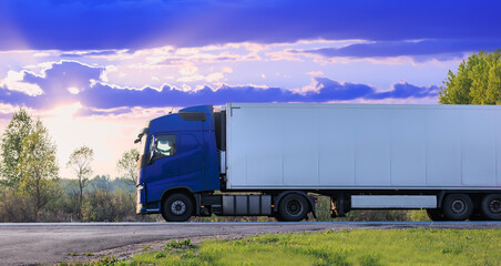 Truck moves on a country road