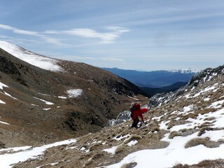 Fototapeta premium April hike on the ridges around Estanys de la Pera in the Pyrenees (Cerdanya). Due to the dime of the year we found both snow and summer conditions.