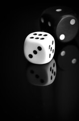 Black and white dices vertical image