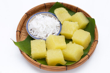 Steamed tapioca cake or cassava cake with grated coconut