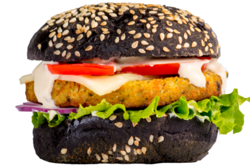 Black burger with cutlet, vegetables and lettuce