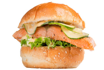Fish burger with a piece of salmon and fresh cucumbers. Tall burger with sauces