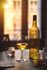 Photo with evening light. Glasses with white wine. Selective focus. 