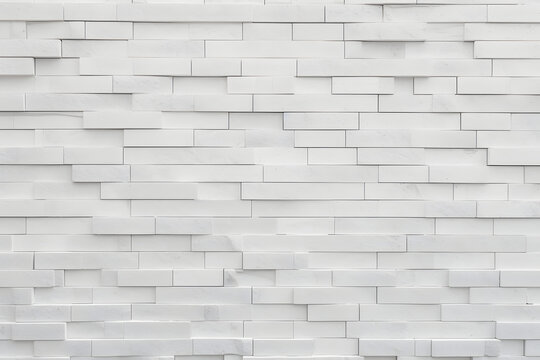 Fototapeta stone wall background wallpaper with grey bricks and white bricks