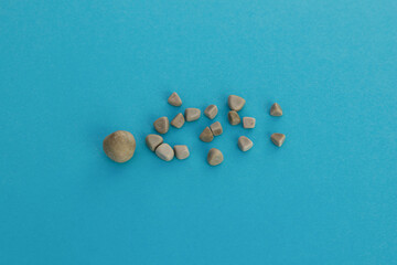 Gallbladder stones close up on blue background