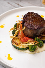 A delicious meat dish from a restaurant. Close up