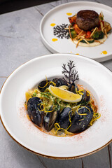 A delicious seafood dish from a restaurant. Close up