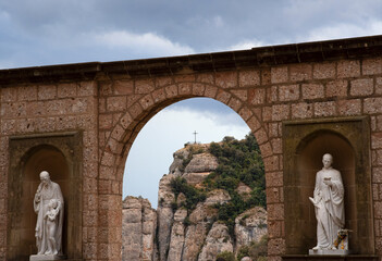 Fototapeta na wymiar Statues and Saint Michaels Cross in Montserrat, Spain