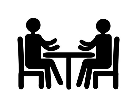 recommend clip art: A flat black drawing of two stick people sitting at a table, isolated on a white background.