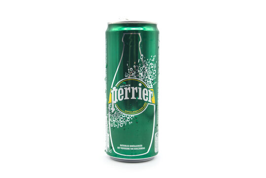 Mulhouse - France - 25 June 2023 - Closeup of green Perrier can of carbonated water on white background