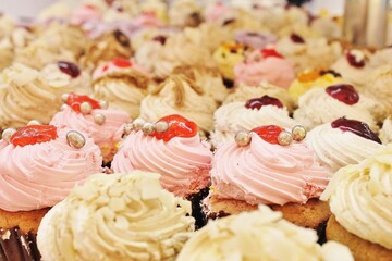 Cupcake's with pink swirl sugar butter and icing frosting stock photo, stock, photograph, image, picture 
