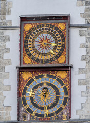 Fototapeta na wymiar Large decorative colorful astronomical clock with sun motives in Gorlitz Germany