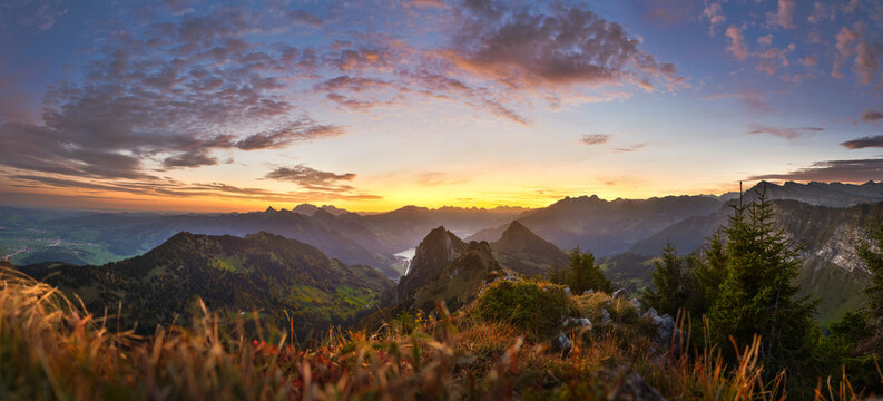 Federispitz, Speer, Mattstock, S&auml;ntis and many other 
 mountain tops at dawn in Switzerland.
