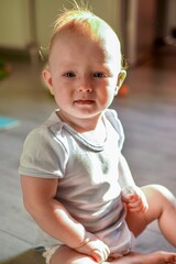 close-up portrait of baby, 10 months old, sweet baby boy, red hair