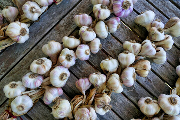 Close up of a completed garlic plait
