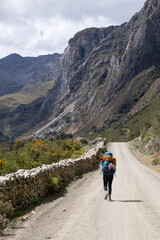 Fototapeta na wymiar hiker in the mountains, Huayhuash, Peru