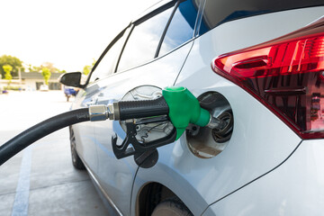 Green gas pump for refueling car on gas station.Green fuel, gasoline dispenser in station.The...