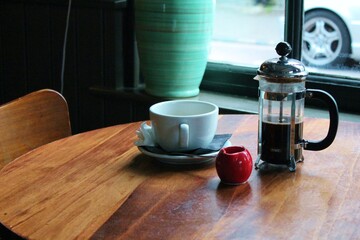 cafe coffee cup and cafeteria on table