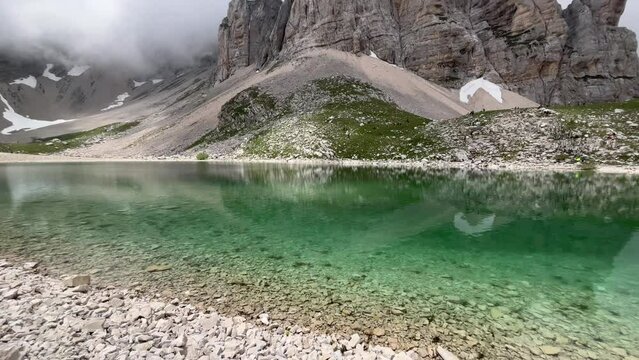 View of Mount Redentore with Lago di Pilato, between the regions Umbria and Marche, in the Monti Sibillini mountain natural park, Italy
