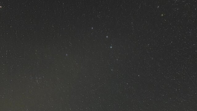 time lapse of the starry sky with clouds at night