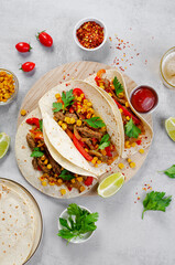 Mexican Tacos with Beef and Vegetables, Tacos al Pastor on Grey Background